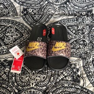 Nike Black and Gold Leopard Slides